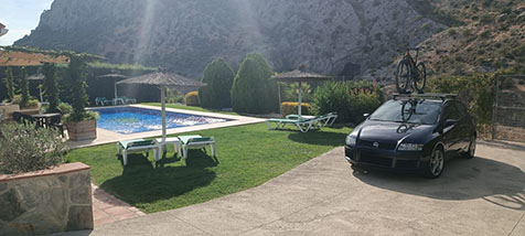Terrace closed to the swimming pool at Casitas Cueva del Gato en Benaoján