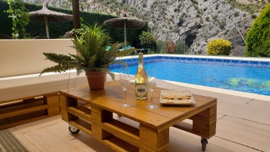 Terrace closed to the swimming pool at Casitas Cueva del Gato en Benaoján