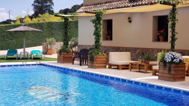 Terrace closed to the swimming pool at Casitas Cueva del Gato en Benaoján