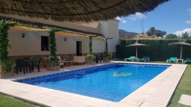 Terrace closed to the swimming pool at Casitas Cueva del Gato en Benaoján